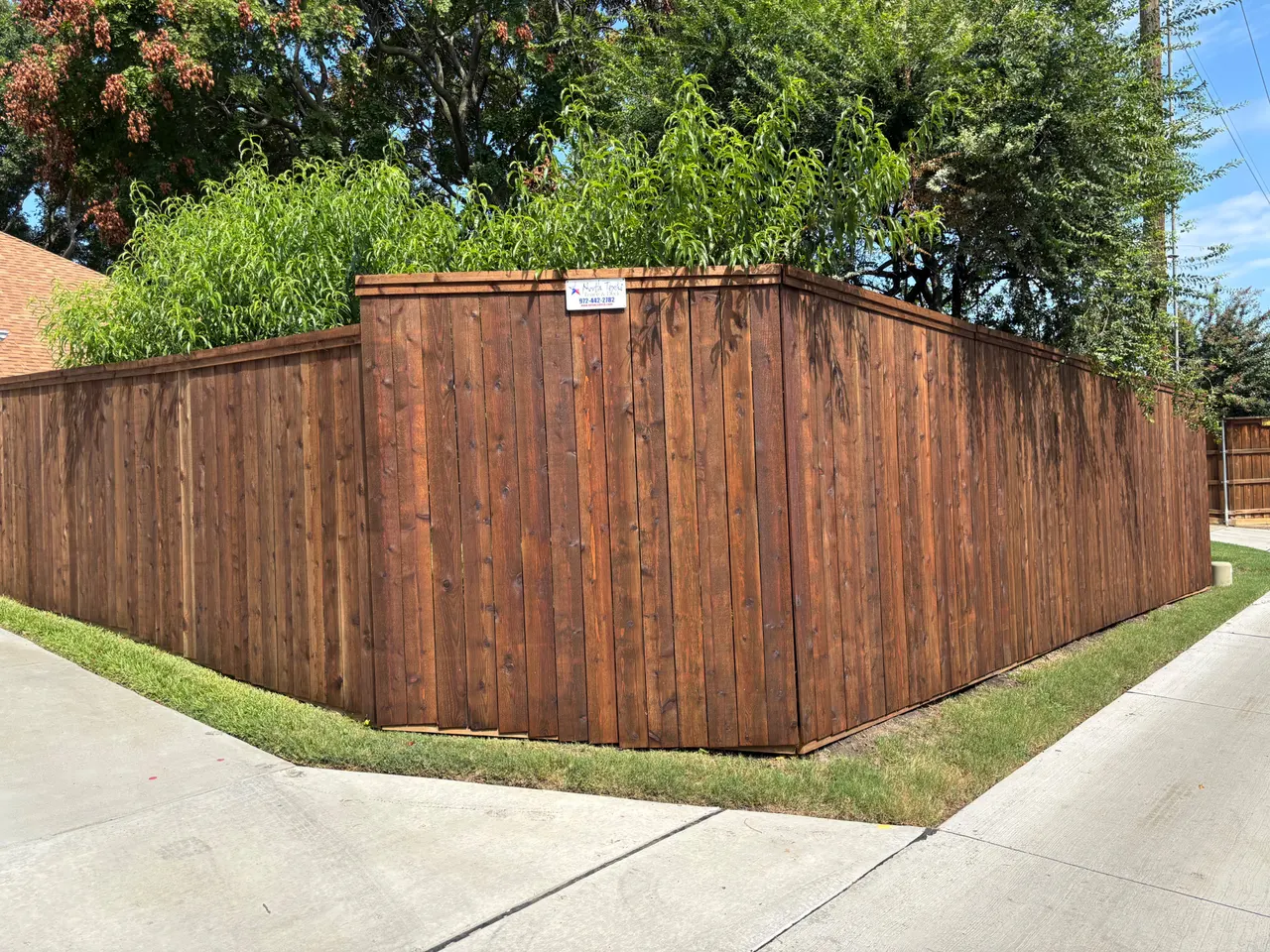 6’ & 8’ pre-stained western red cedar fence side by side style with double trim. — Wylie
