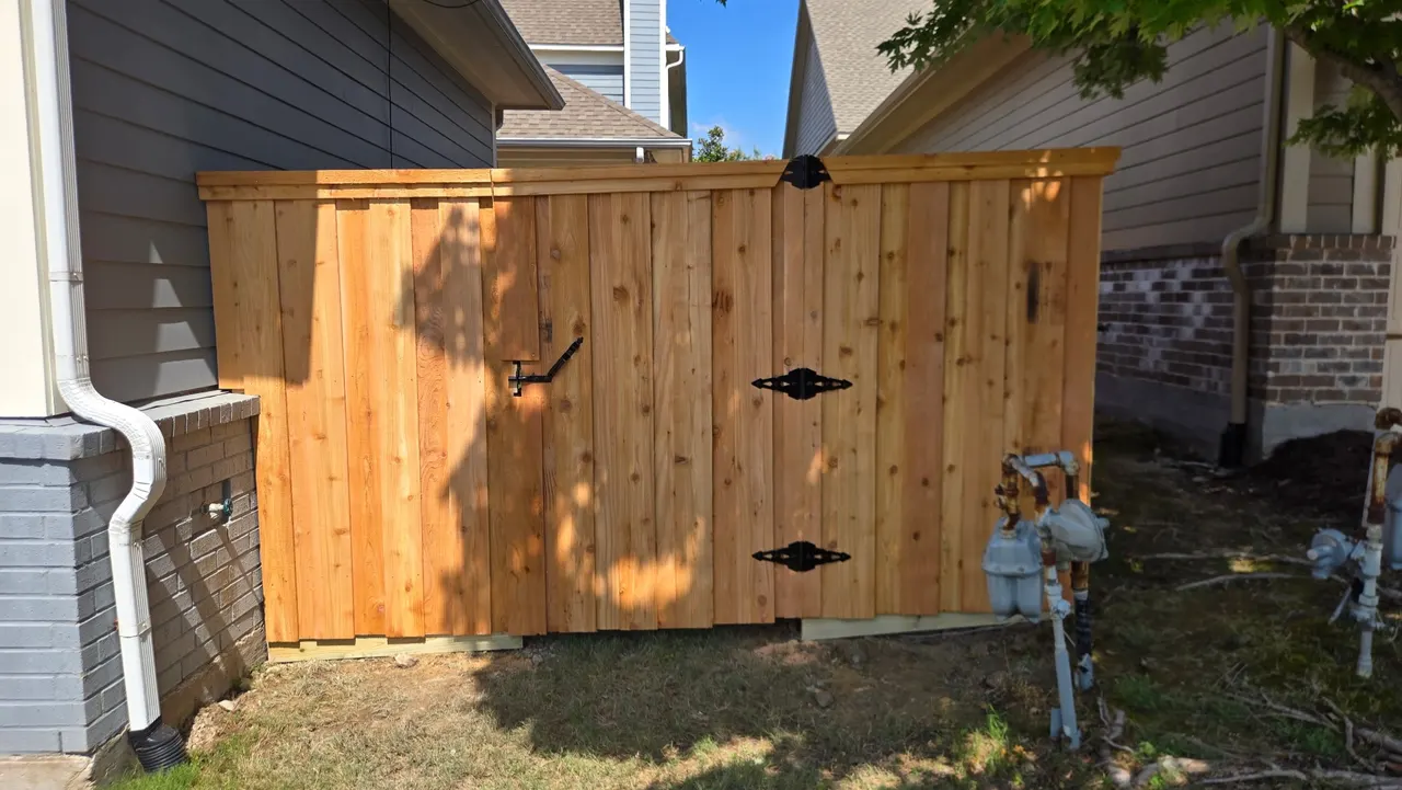 6 ft Cedar board on board w/ double trim & pressure treated 2” x 6”. — Garland