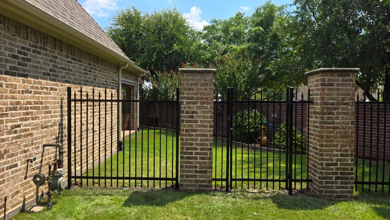 6 ft wrought iron fence with quad fennels. — Richardson