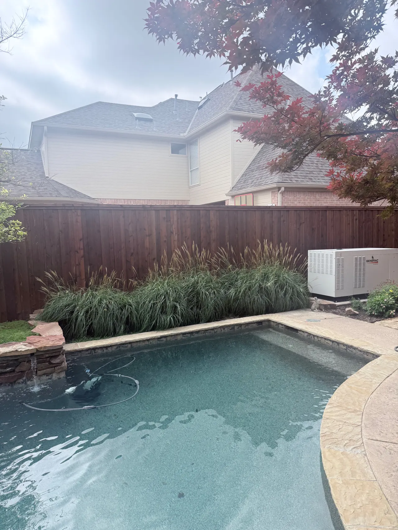 8ft Cedar Board on Board fence pre stained Classic Cedar tone color. — Plano