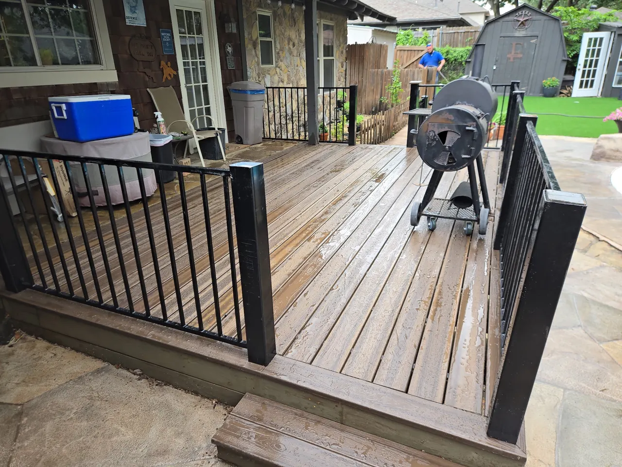 Composite deck- Black Walnut color, 3 ft. Tall wrought iron handrails. — Frisco