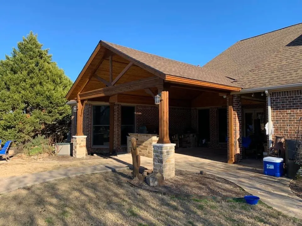 Custom cedar patio cover and outdoor kitchen — Addison