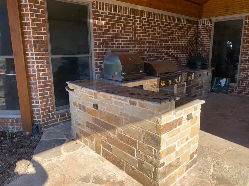 Custom cedar patio cover and outdoor kitchen — Addison