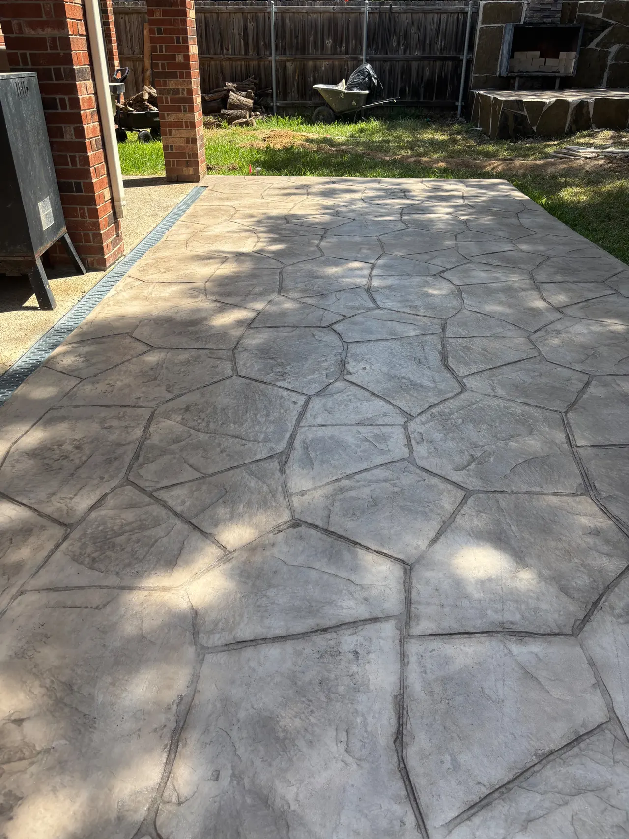 Patio extension- Stanped concrete Orchard stone pattern, color: Smoke — Garland