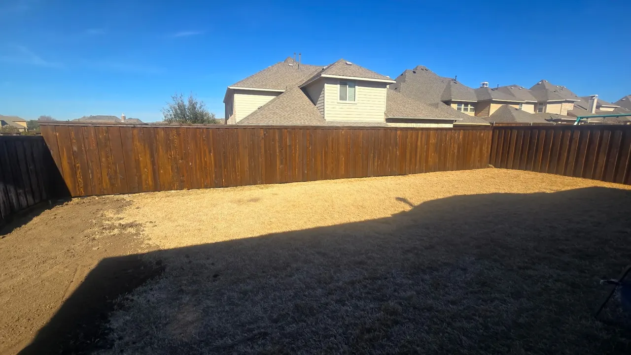 Pre-stained 6 ft cedar board on board w/ a 1 ft tall pressure treated retaining wall and added seller fill dirt to level out the side yard. — Frisco