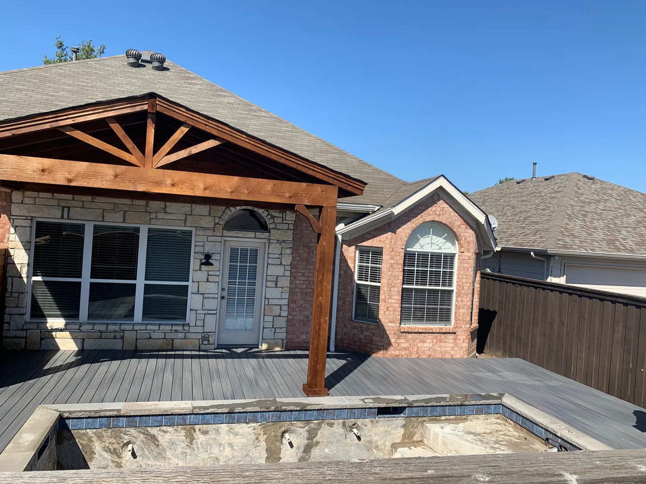 Western red cedar gable style patio cover and harbor grey color composite deck — Richardson