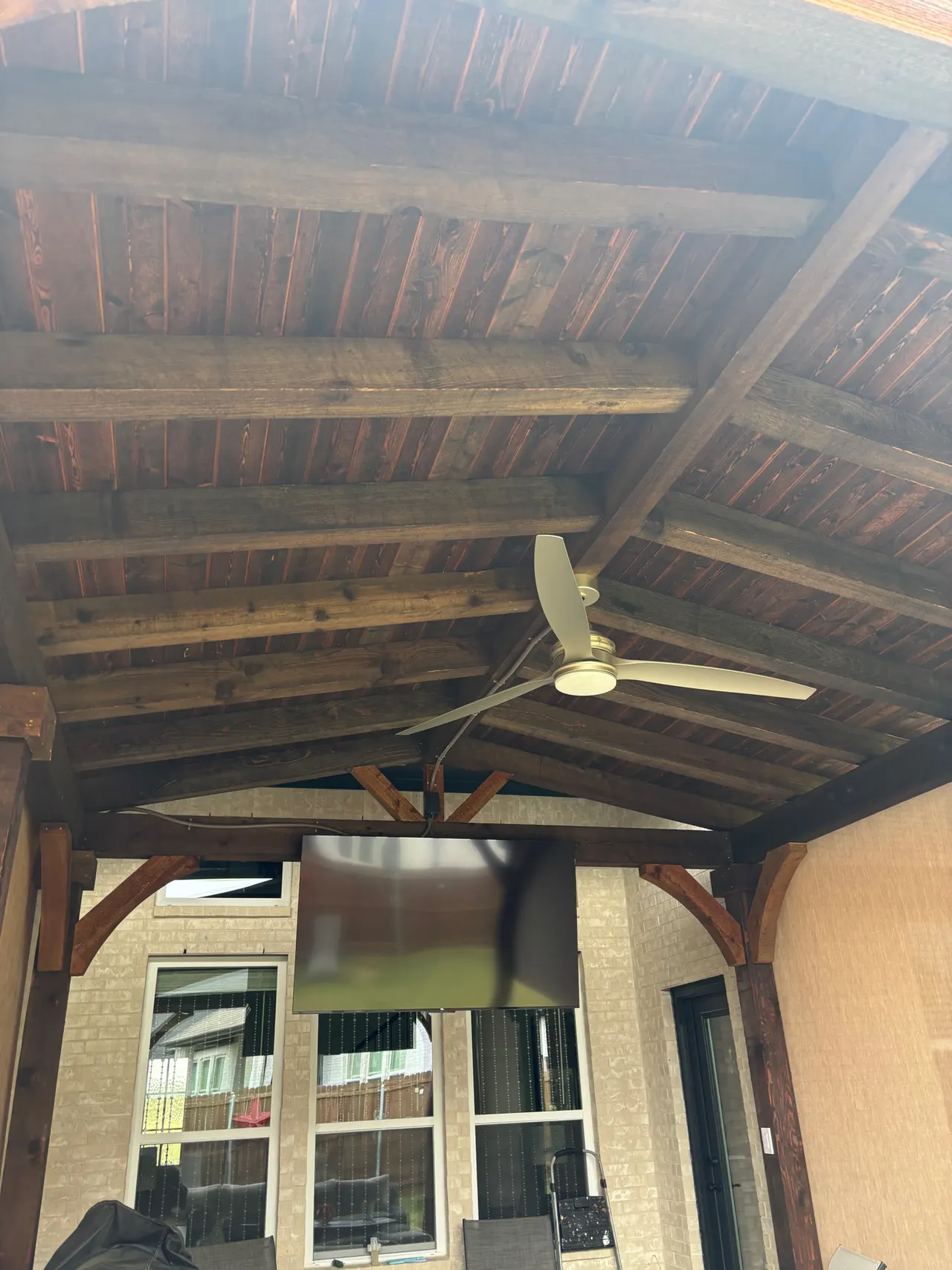 Western red cedar Gable style patio cover with roll down sun shades. — Lavon